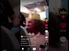 KICK HER OFF THE PLANE