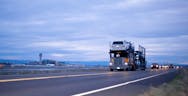 Large Truck Passing On Highway