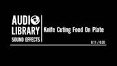 Knife Cuting Food On Plate