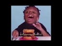 Kid laughing at burger