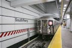 Subway platform train arrives 