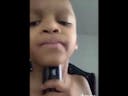 Kid uses grandmas voice box for auto tune