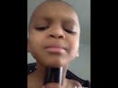 Kid uses grandma voice box for auto tune (WOW)