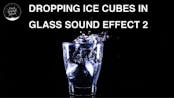 Ice Cube Dropping In Glass