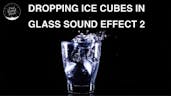 Ice Cube Dropping In Glass