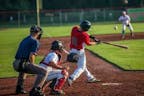 Bat Hits Baseball 