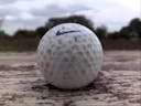 Golf Ball On Pavement