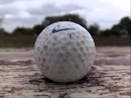 Golf Ball On Pavement