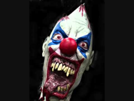 Scary clown laughing